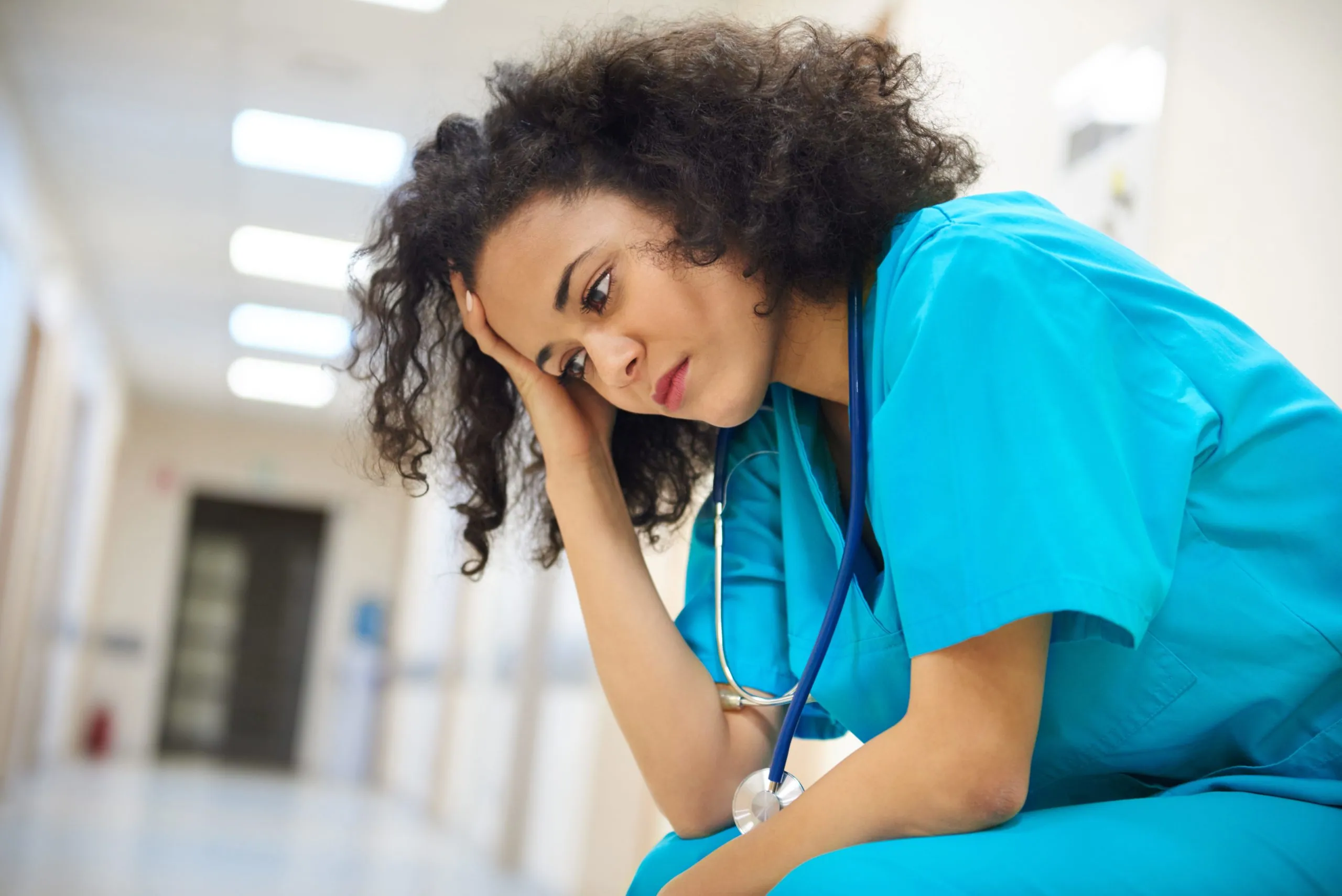 Frustrated nurse in the corridor.